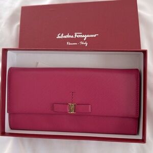 Salvatore Ferragamo Fuschia Leather Wallet 7 1/2” x 4” holds 10 card slots